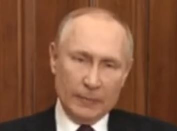 Linguaggio del corpo di Putin linguino